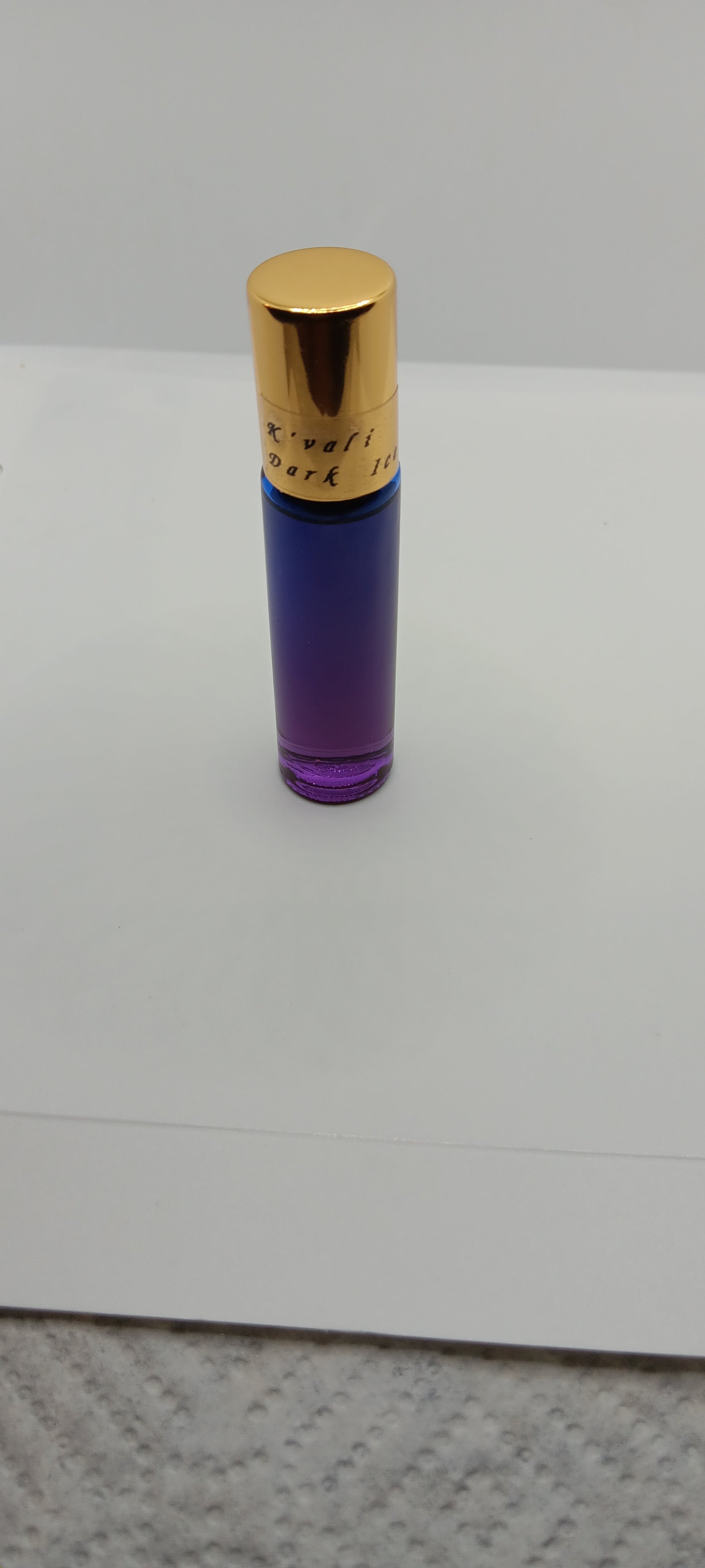 K'vali Dark Ice/ Blue and Purple Bottle